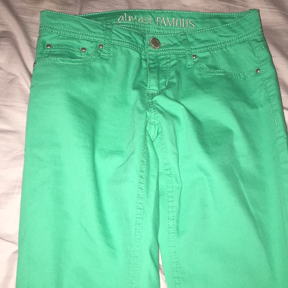 Aqua/teal/turquoise colored jeans